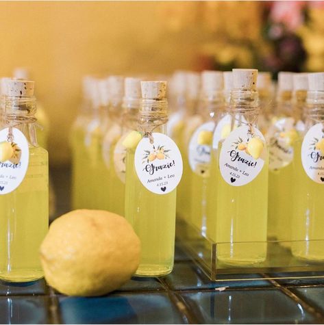 File this under "Wedding Favors Your Guests Won't Toss!" 🍋 Gifting your guests with delicious homemade Limoncello is such a fun idea. Limoncello Favors Mini Bottles, Limoncello Bottles Wedding Favours, Limoncello Labels Printable Free, Lemoncello Bridal Shower Ideas, Limoncello Bottle Design, Positano Bridal Shower Theme, Positano Theme Party, Limoncello Wedding Favor, Limoncello Party