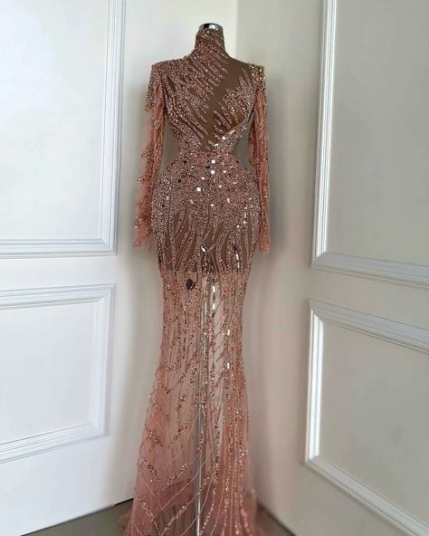 Share with a friend or tag someone who would sparkle in this luxurious rose gold gown! To order this glamorous rose gold gown, send us a DM at @reineecouture. This rose gold gown is a masterpiece of glimmering elegance and detailed craftsmanship. The fitted bodice is adorned with an array of shimmering crystals and beads, intricately placed to create a dazzling, light-catching effect. The gown’s delicate straps and neckline are enhanced with 3D floral embellishments, adding a whimsical and f... Rose Gold Gown, Gold Sequin Gown, Nude Gown, Rose Gold Dress, Gold Gown, Mermaid Sequin, Rose Gold Beads, Rose Gold Sequin, Sequin Evening Dresses