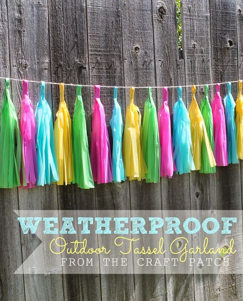 Have you seen the cute tissue paper tassel garlands popping up around blogland? I think they are adorable! I've got a very special birthd... Plastic Tablecloth Decorations, Backyard Party Decorations, Diy Tassel Garland, Outdoor Garland, Tissue Paper Tassel Garland, Tissue Paper Tassel, Table Cloth Decorations, How To Make Tassels, Pool Party Decorations