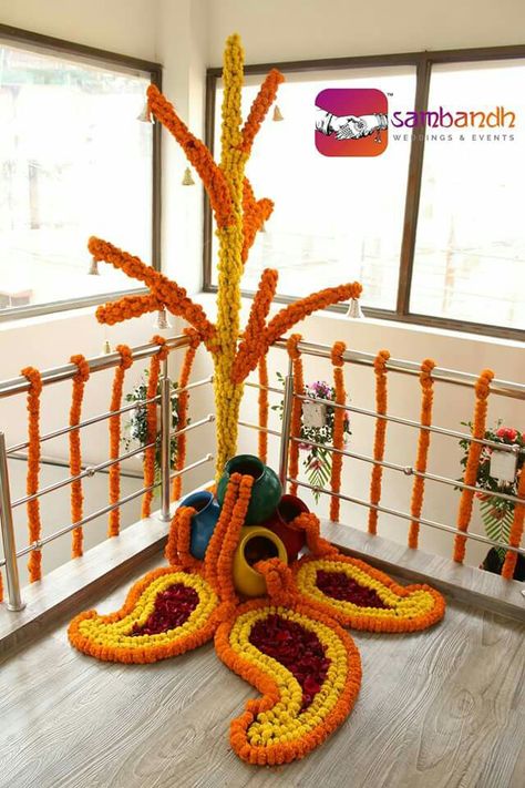 Flower and matka decoration for mehendi function Matka Decoration, Mehendi Function, Home Flower Decor, Diwali Decorations At Home, Housewarming Decorations, Diy Diwali Decorations, Flower Decorations Diy, Rangoli Ideas, Desi Wedding Decor