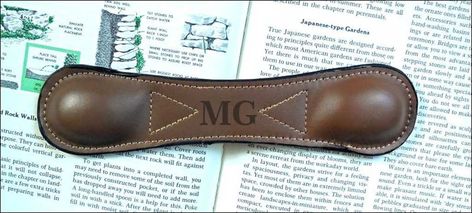 PRICES MAY VARY. Monogrammed leather bookmark page weight with two upper case initials. Genuine leather bookmark is lead weighted to keep your books open flat. Monogram will be engraved in caps. Color: color range runs from tan to brown Size: 8.75" x 2" Each piece is unique! There will be variations on each piece in surface finish and flaws. Engraving color will vary in shade of brown from piece to piece. Makes a great gift for any occasion. Comfort House # P2750. Monogrammed leather bookmark pa Books Open, Personalized Bookmarks, Leather Book, Leather Bookmark, Block Style, Leather Books, Monogram Styles, Monogrammed Leather, Upper Case