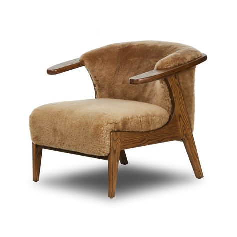 Dimensions: 30.75"w x 33.00"d x 28.25"h Arm height: 28 in Seat height: 17.3 in Seat depth: 23 in Seat width: 22 in Materials: 100% Sheared Sheepskin, Solid Ash Color: Desert Shearling, Amber Ash Wood Weight: 39 lbs Subtle paddle arms and a wrap frame of amber-finished ash embrace soft brown shearling, while S-spring construction ensures exceptional comfort. Candle Table Decorations, Bedroom Sideboard, Study Furniture, Dude Ranch, Living Room Furniture Sofas, Kitchen Mirror, San Clemente, Dining Room Bench, Four Hands