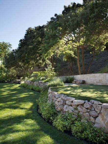 Outdoor Oasis | 2023 | HGTV Steep Front Yard Landscaping Ideas, Terraced Driveways, Landscape Design On A Hill, Garden Design On Hill, Cottage Retaining Wall, Retaining Walls Backyard, Layered Backyard Landscaping, Stone Wall With Plants, Rock Slope Landscaping