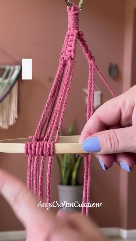 How to add a hoop to your macrame work. Think double half hitch but with the hoop as your filler cord. Head to my YouTube for macrame tutorials. #macrame #macrameartist #macrametutorial #macramecommunity #macramemakers #macramehowto #macrameknots #macramedecor #handmade #diymacrame #doublehalfhitch #angscraftsncreations | AngscraftsnCreations Macrame | Macrame Hoop, Half Hitch Knot, Macrame Tutorials, Simple Macrame, Macrame Planter, Hoop Projects, Macrame Hanger, Hanging Macrame, Macrame Decor