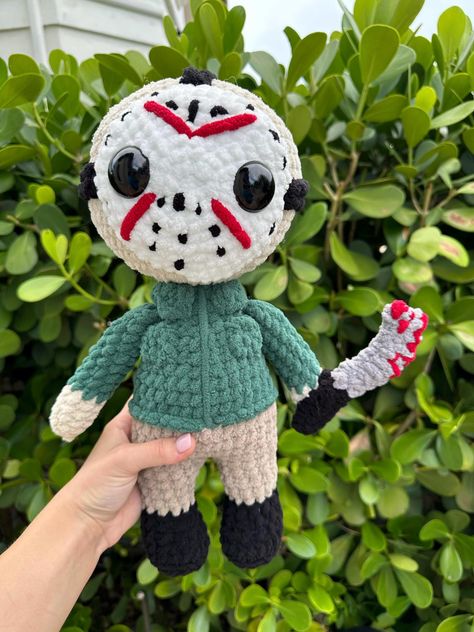 Handmade crochet horror Jason slasher amigurumi Pattern by @donebydonielle Made with Bernat Blanket yarn, safety eyes, and poly-fil stuffing  You will be receiving the exact product pictured  Not recommended for children under 5 Spot clean only *I personally make these crochet items and please note that while I put my full love and effort into them, they are handmade and therefore may have minor imperfections Crochet Jason Voorhees Pattern, Horror Movie Crochet Patterns Free, Jason Slasher, Horror Crochet Pattern, Crochet Horror, Horror Crochet, Creepy Stuffed Animals, Friends Crochet, Stuff Animals