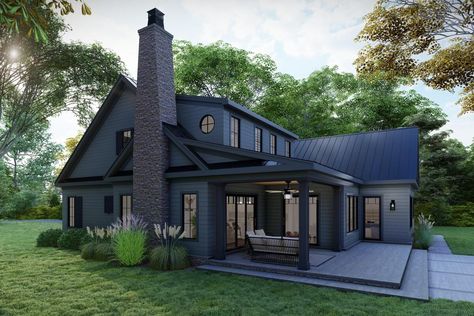 The fresh exterior of this New American home plan showcases a ribbed metal roof and forward-facing, double garage. Inside, exposed beams line the 10 ft ceiling of the great room and a multi-panel door retracts for easy access to the back porch / terrace. Two islands help merge the kitchen with the living space, while offering plenty of workspace, and a breakfast nook and formal dining room lend a variety of options for meals. The primary bedroom is conveniently located on the main level and boas Small Lot Floor Plans, Lake Home Floor Plan, Bungalow With Loft Floor Plans, Small Lakefront House Plans, Best Small House Plans, Small Cottage House Plans 3 Bedroom, Bungalow Floor Plans One Story, Cottage Home Floor Plans, Steel Building Homes Floor Plans