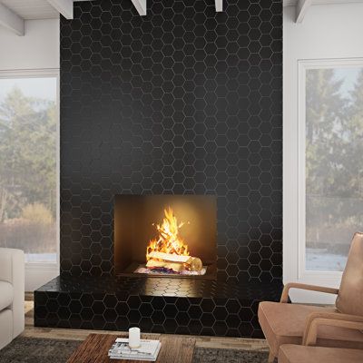 Elevate your design with this trendy ceramic 4" hexagon tile. Its popular shape available in matte black creates a simple, yet impactful style. Complete your vision in the bathroom, kitchen, or living room. | Itona 4" x 4" Hexagon Ceramic Floor and Wall Tile Black 4.0 x 4.0 in | ACBX1049 | Wayfair Canada Hexagon Tile Fireplace, Black Porcelain Tiles, Black Hexagon Tile, Black Fireplace, Polished Porcelain Tiles, Best Floor Tiles, Porcelain Mosaic Tile, Black Tiles, Hexagon Tiles