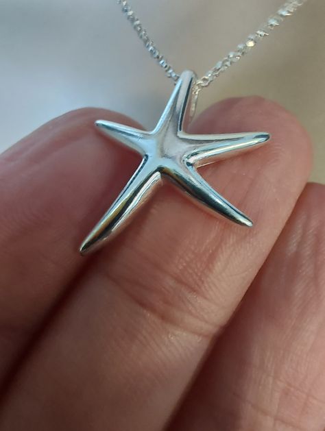 "Sterling silver starfish necklace in your choice of lengths Starfish pendant measures 19.1 mm × 22 mm Chain is a dainty yet tough Rolo link in your choice of lengths. Shown in 16\" on a size small mannequin. All parts of this necklace are solid 925 sterling silver. Packaged in a small gift box tied with ribbon." Silver Starfish Necklace, Jewellery Silver Necklace, Small Mannequin, Starfish Pendant, Starfish Necklace, Silver Jewelry Necklace, Dope Jewelry, Funky Jewelry, Jewelry Lookbook