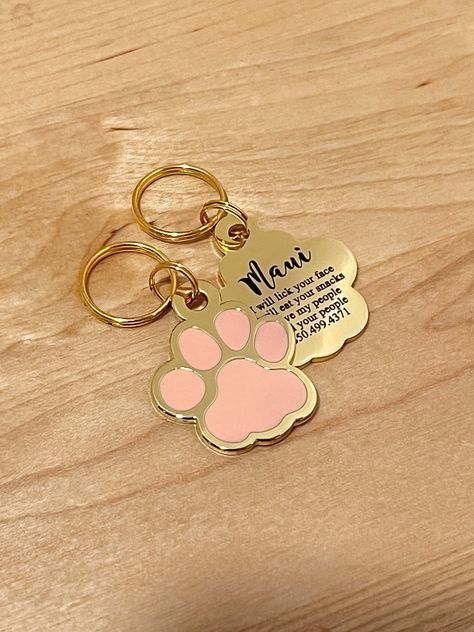 SHIPS IN 1-2 DAYS ~ FROM USA :) Custom laser engraved pet tag Tag is approx. 25mm Add pet name & up to 5 lines of informational text Split rings included Hard enamel + Stainless steel  Visit our shop for more dog tag styles! Etsy.com/shop/thesaltyhut thesaltyhut.com instagram @thesaltyhut All content of our shop (text, images) is the property of The Salty Hut, LLC. It is protected by the United States and International Copyright Laws. Any use of our content is strictly prohibited without our written consent. ⓒ 2017 THE SALTY HUT, LLC. All Rights Reserved. Tag Styles, Accessories For Dogs, Pink Paw Print, Pink Paws, Pet Name, Split Rings, Informational Text, Animal Ornament, Pet Tags