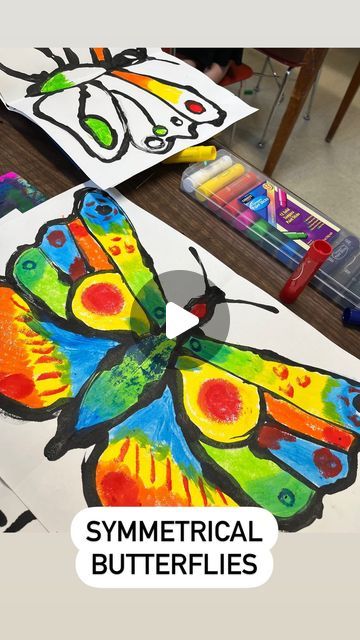 Savanna🎨 on Instagram: "Symmetrical butterflies with kindergarten! This was a fun one that the kiddos loved- and it gave them some knowledge of life cycles, symmetry, paint skills, patterns and colors in nature, and much more!   #artforkids #artwithkids #kindergartenart #artistsatwork #workinprogress #elementaryart #elementaryartclass #elementaryartteachers #elementaryteacher #artteachers #artteacher #artteachersofinstagram #artteacherlife #animalart #shading #texture #animaldrawing #realisticdrawing #artworkoninstagram #artworkoftheday #butterflyart #butterflies #kinder  #artlesson #elementaryartlesson #springart" Pattern Art For Kindergarten, Symmetrical Butterfly Art For Kids, Symmetry Art Projects, Butterfly Cycle, Colors In Nature, Symmetrical Art, Symmetry Painting, Symmetrical Pattern, 3rd Grade Art