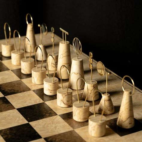 Made entirely by hand, each piece is meticulously assembled from 21,249 individual elements, applying ancient 18th-century wood mosaic techniques. #luxurychess #chessdesign Homemade Chess Pieces, Chess Decor, Flat Aesthetic, Mosaic Techniques, Pottery Games, Chess Design, Chess Boards, Wood Games, Wood Mosaic