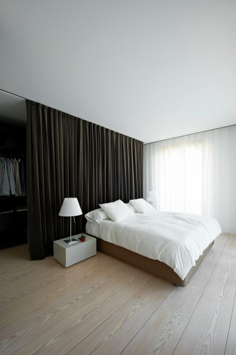 Image 16 of 16 from gallery of House A / Vaillo & Irigaray + Beguiristain. © Iñaki Bergera Closet Behind Bed, Ideas De Closets, Curtain Minimalist, Closet Curtain, Curtains Behind Bed, Minimalist Bedroom Design, Room Divider Curtain, غرفة ملابس, Bed Curtains