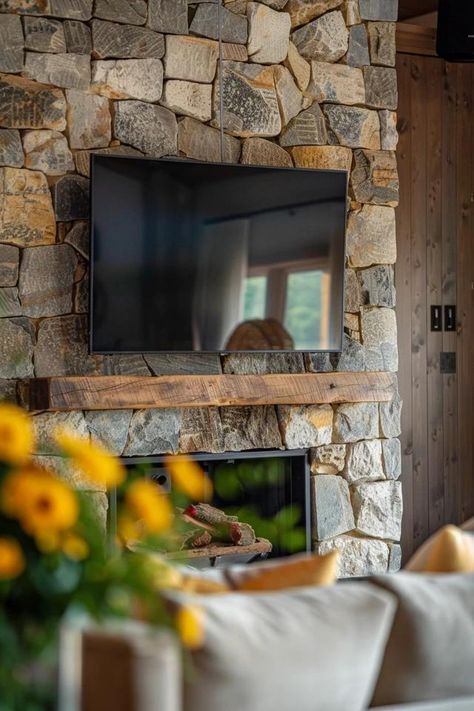 How To Mount A TV On A Stone Fireplace: Installation Tips Stone Fireplace Tv Mount, How To Mount Tv On Stone Fireplace, Frame Tv Over Stone Fireplace, Tv Above Stone Fireplace, Tv Over Stone Fireplace, Tv On Stone Fireplace, Stone Fireplace With Tv, Fireplace With Stone, Cheap Basement Remodel