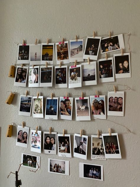 Polaroid Wall With Lights, Hanging Up Polaroids, Polaroid Pictures Display Aesthetic, How To Hang Up Polaroids, Diy Polaroid Wall Decor, Mini Photos On Wall, Polaroid Display Ideas Creative, Polaroid Pictures Decor, Polaroid Pictures Display Bedrooms