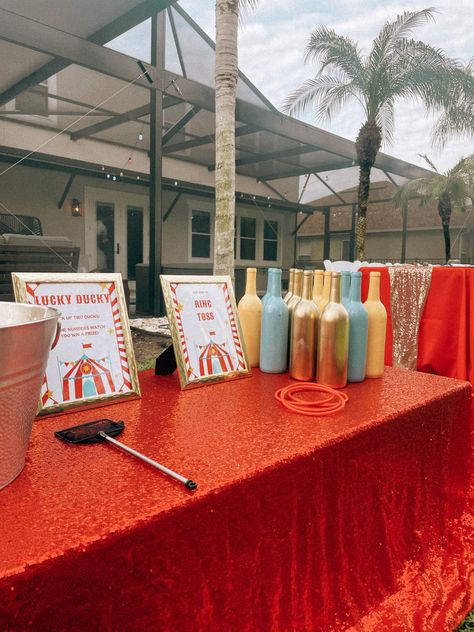 Carnival Birthday Party | CatchMyParty.com Adult Carnival Birthday Party, Carnival Centerpiece Ideas, Diy Carnival Decorations, Adult Circus Party, Carnival Centerpieces, Class Reunion Planning, Carnival Birthday Party Ideas, Backyard Carnival, Carnival Night