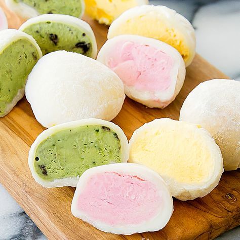 Japanese mochi ice cream can be made in your own home. You can customize with your favorite flavors of ice cream and keep them stored in the freezer for a fun and delicious treat. I adore mochi ice cream. For those unfamiliar, mochi is a Japanese rice cake made with glutinous rice flour and has a … Ice Cream Mochi, Cream Mochi, Mochi Balls, Desserts Japonais, Mochi Ice, Mochi Recipe, Mochi Ice Cream, Easy Japanese Recipes, Snack Craving