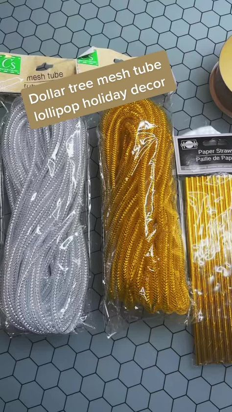 Dollar tree mesh tube lollipop holiday decor #foryou #dollartree #dollartreediy #diy #diyprojectsideas #diyproject #homedecor #christmas2021 Plastic Tubing Crafts, Tube Mesh Ideas, Mesh Tube Crafts Christmas, Diy Lollipops Decorations, Dollar Tree Mesh Tube Ideas, Dollar Tree Lollipop Diy, Mesh Tubing Crafts Diy, Dollar Tree Diy Christmas Decorations, Plastic Coat Hanger Crafts