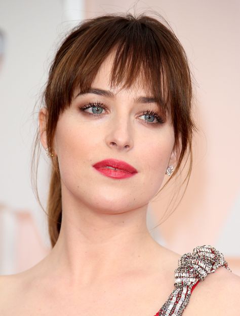 Bangs (aka Fringe): Bangs can vary in style and length (blunt, curved, side-swept), but generally the hair is cut from the outer corner of each eye and the ends just graze the edge of the brows. Celebrity Updos, Dakota Johnson Hair, Haircut Images, Bangs For Round Face, Celebrity Makeup Looks, Melanie Griffith, Fringe Bangs, Vibes Wallpaper, Goldie Hawn