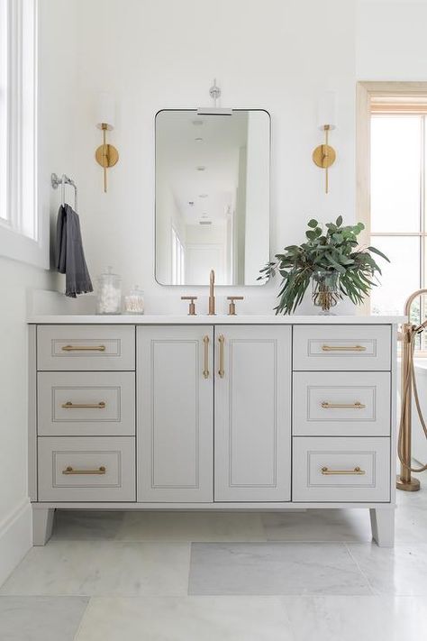 Brass Hardware Bathroom, Curved Vanity, Bathroom Cabinet Colors, Light Grey Bathrooms, Grey Bathroom Cabinets, Light Gray Cabinets, Silver Bathroom, Grey Bathroom Vanity, Brass Sconces