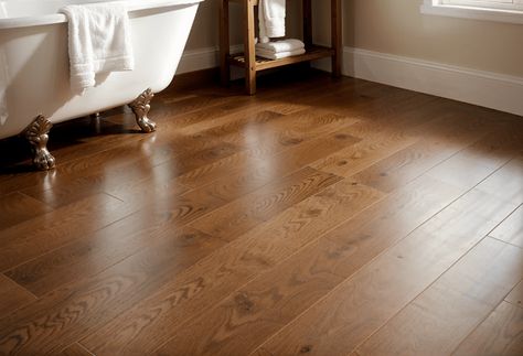 17 Gorgeous Bathroom Flooring Ideas Trends (Durability, Safety & Style) Master Bath Vinyl Plank Flooring, Bathroom Wood Flooring Ideas, Lvp Flooring In Bathroom, Tile Floor Bathroom Ideas, Luxury Vinyl Plank Flooring Colors, Vinyl Plank Flooring Colors, Bathroom Flooring Trends, Bathroom Flooring Ideas, Arch Entryway