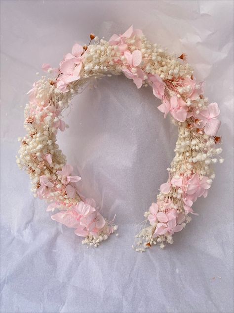 A wedding crown of dried flowers is a unique accessory for your wedding. The flower wreath combines rose flowers, hydrangea, ozotamnus, glisia, cortaderia, and briza, together pink flower crown looks incredibly gentle and romantic. Also, a boho crown will look good on bridesmaids or morning wedding rituals.  We process dried flowers and combine them into beautiful flower headbands. So all our wedding flower crowns are handmade. In our catalog, you will find the magnificent bridal crown.  The size M is on the photo.  💫 Wildflower bouquet consists: -stabilized rose -stabilized hydrangea -asparagus -ozotamnus -glisia -cortaderia -briza 🌷 Our bridal flowers are an eco-friendly bridal gift and accessory. Preserved flowers for around 3-5 years will allow you to enjoy them for a long time.  HAN Httyd Wedding, Floral Hair Piece, Crown Handmade, Pink Flower Crown, Flower Princess, Boho Flower Crown, Flower Tiara, Floral Hair Pieces, Fairy Crown