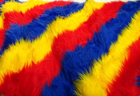 "Product Info: Faux Fake Fur Striped Rainbow Long Pile Fabricis a new, fun, and unique type of fabric. The stripes come in 3 interchanging colors (Red Yellow Blue ) with a thickness ). The pile length is about 1.8\"-2.3\" (inch) in length and is sold in continuous yards. Still this fabric is durable, warm, and very easy to take care of. Either way, by selecting Striped Faux Fur you are getting the best product on the market for the best price. Uses: Can be used for Fur Coats, Fur Clothing, Blank Clowncore Aesthetic, Howleen Wolf, 디즈니 캐릭터, Catty Noir, Rainbow Aesthetic, Yellow Aesthetic, Yellow And Blue, Red Aesthetic, Blue Aesthetic