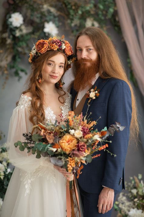 Large boho fall wedding bouquet The bouquet is made of artificial material, preserved material and other arranging material. Photo: Michaela Durisova photography Model: Valéria and Tibor Dress, suit: Svadobný salón Ľubica Matching earrings: https://www.etsy.com/uk/listing/1416814663/autumn-wedding-flower-earrings-circle?click_key=336fc67bc2f7f83656b32c29cf1d8b26c36c1ac5%3A1416814663&click_sum=c4fd0010&ref=shop_home_active_1&sts=1 Matching crown: https://www.etsy.com/uk/listing/1416649803/orange- Autumn Wedding Flower Crown, Fall Wedding Accessories, Fantasy Fall Wedding, Autumn Equinox Wedding, Cottage Core Wedding Bouquet, Autumn Bride Bouquet, Boho Wedding Bouquet Wildflowers, Rustic Boho Wedding Bouquet, Wedding Dresses Autumn