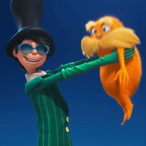 the onceler holding the lorax from the lorax movie 2012 Lorax And Onceler Matching Pfps, Popular Movie Duos, Lorax Character Costumes, Lorax Couple Costume, The Lorax And The Onceler, Duo Movie Characters, Ohare Lorax, Lorax Matching Pfp, Mr Ohare