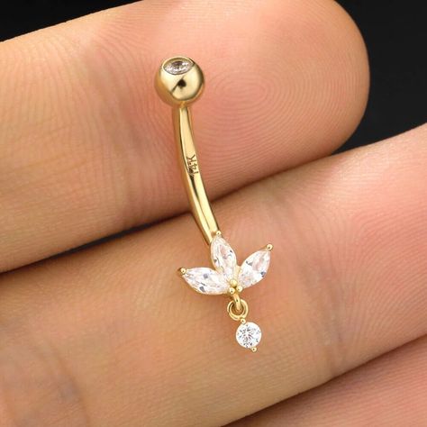 14K Solid Gold 14G flower Shape Belly Button Ring,Moissanite Diamond Lotus Belly Button Ring ,Curved Barbell,Navel Piercing Jewelry This elegant solid gold navel barbell features our largest invisible set lotus design, with no visible bezels or prongs, creating a floating effect on the skin. A delicate dangle adds a touch of movement and sophistication to the top of the navel, making this piece a perfect blend of elegance and modern style. --- IᑎᖴOᖇᗰᗩTIOᑎ ᗩᗷOᑌT ᑭᖇOᗪᑌᑕT --- ❖ Metal Type: 14K,18K Solid Gold ❖ Diamond Type: Moissanite ❖ Diamond Shape: Round Cut Diamond and Fancy Cut Diamond ❖ Diamond Size; 6mm or 9mm ❖ Diamond Color: G-H ❖ Diamond Clarity: VS ❖ Length: 5mm, 6.5mm, 8.00mm, 9.5mm, 11.00mm ❖ SKU: OSTJ257 "The size may differ depending on measurement methods." "The colour display Dangling Belly Button Piercing, Cute Belly Rings Stud, Flower Belly Ring, Dainty Gold Belly Button Piercing, Belly Button Piercing Dangle, Dainty Belly Button Piercing, Belly Button Piercing Aesthetic, Gold Belly Button Piercing, Cute Belly Rings