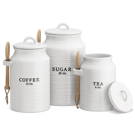 PRICES MAY VARY. Ceramic Kitchen Canister Set w/ Scoop - Our canister sets for kitchen counter are great for holding coffee, sugar, tea or even flour. This stylish set of 3 ceramic kitchen canisters are printed with a rustic text that evokes a vintage charm. Airtight and Food Safe - The airtight kitchen canisters for countertop come with silicone lined lids and wooden spoons. Their solid design will keep the contents fresh and dry. The tea, coffee, sugar canister set is great for storing cookies Canister Sets For Kitchen, Decorative Kitchen Canisters, White Canister Set, Ceramic Kitchen Canister Sets, Farmhouse Canisters, Ceramic Kitchen Canisters, Ceramic Canister Set, Kitchen Countertop Decor, Ceramic Canisters