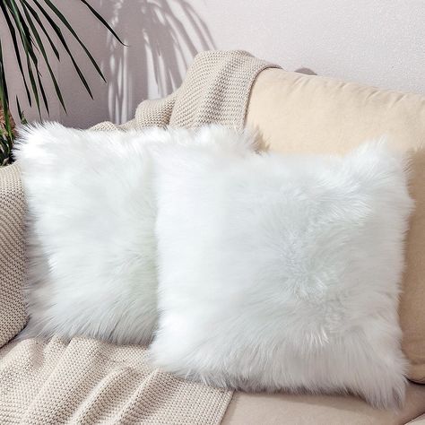 PRICES MAY VARY. 70% Polyester and 30% Acrylic 【Soft and fluffy】 Faux Sheepskin pillow case: the material is high density and super soft faux fur, and the back is crystal super soft fabric。 【Multi-Application】 It Can Be Used for Decorative Pillows of Bed Head, Sofa, Chair, Balcony and Car in Bedroom. Make Your Space More Beautiful. 【Environment Friendly Nontoxic】The Material is Made of Environment-Friendly and Non-Toxic Polyester and Acrylic Fiber. Whether The Elderly, Children or Pets Can Exper Fluffy Cushions Bedrooms, White Fuzzy Pillow, Fluffy White Pillow, Fluffy Pillows Aesthetic, White Fluffy Pillows, Winter Sleepover, White Fluffy Pillow, Sheepskin Pillow, White Fur Pillow