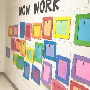 The wall is ready for a new batch or work this year! Good Work Display Classroom, Family Wall In Preschool, Primary Color Bulletin Board, Art Board Preschool, Montessori Preschool Classroom Decor, Pre K Wall Ideas, Daycare Art Wall Ideas, Drawing Display Ideas, Cute Classroom Bulletin Board Ideas