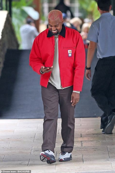 Kanye West flashes rare smile as he steps out solo leaving Hotel Bel-Air in red Carhartt jacket Red Carhartt Jacket Outfit, Kanye Carhartt, Kanye West Outfits Street Styles, Kanye West Carhartt, Kanye Smiling, Kanye West Fits, Red Jacket Outfit Men, Kanye Happy, Kanye West Jacket