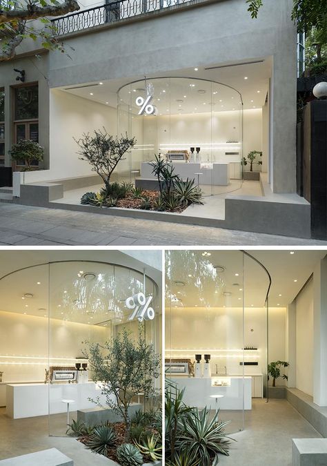 This Coffee Shop's Curved Glass Facade Makes The Interior Completely Visible From The Street Bright Coffee Shop, Small Retail Space, Modern Coffee Shop, Glass Facade, Retail Facade, Shop Facade, Storefront Design, Cafe Shop Design, Showroom Interior Design