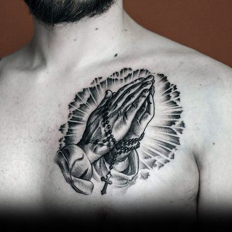 Male Chest Praying Hands With Beads Interesting Tattoo Tattoos Dragonfly, Hands With Rosary, Jesus Hand Tattoo, Garter Tattoos, Rosary Tattoo On Hand, Prayer Hands Tattoo, Praying Hands With Rosary, Rosary Tattoos, Lion Chest Tattoo