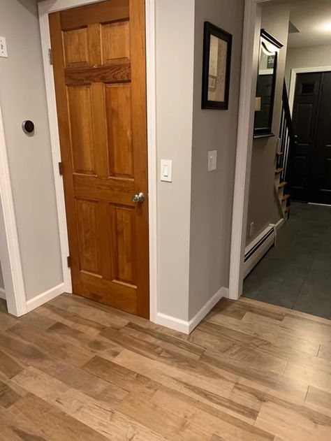 Stained Interior Doors With White Trim Farmhouse, Wood Door White Trim Interior, Wood Doors And White Trim, White Woodwork With Stained Doors, Light Trim Dark Doors, Wood Doors With Painted Trim, Wooden Doors With White Trim, Painted Door With Stained Wood Trim, White Trim Dark Doors