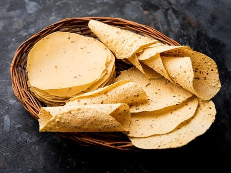 Garlic Papad (Lahsun Papad or Lasan Papad) are a traditional Indian snack and is a perfect accompaniment to any Indian meal especially during lunch time. Made with black gram, garlic and spices, they are hugely popular with everyone. As with any traditional Indian food, Garlic Papads have numerous regional variations […] The post Garlic Papads appeared first on Awesome Cuisine. Papad Indian Food, Papad Recipe Indian, Papad Recipe, Traditional Indian Food, Black Gram, Indian Meal, Savoury Biscuits, Green Garlic, Cracker Recipes