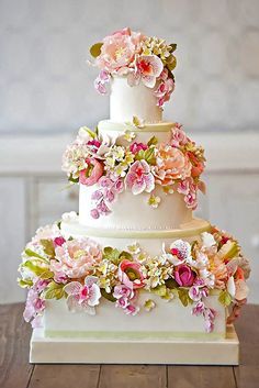 Elaborate Fondant Flower Wedding Cakes ❤ See more: http://www.weddingforward.com/fondant-flower-wedding-cakes/ #weddings Wedding Cake Fondant Flowers, Spring Wedding Cake, Fondant Wedding Cakes, Floral Wedding Cake, Pink Wedding Cake, Floral Wedding Cakes, Fondant Flowers, Cake Trends, Wedding Cake Decorations