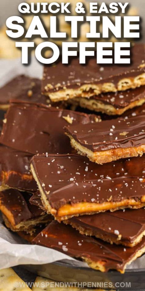 Saltine Toffee (also known as Christmas Crack) is a budget-friendly dessert that everyone loves. Saltine crackers are drizzled with a brown sugar & butter mixture, then layered with chocolate and sprinkled with sea salt. Whether they are made for the family, the office, or for school, this Christmas Crack will be everyone's new holiday favorite! #saltinetoffee #christmascrack #dessert #spendwithpennies Caramel Saltine Crackers, Desserts Using Saltine Crackers, Chocolate Saltine Bark, Crackers With Caramel And Chocolate, Sweets Made With Saltine Crackers, Ranch Saltine Cracker Recipes No Bake, Crackers With Chocolate Saltine, Saltine Chocolate Bark, Chocolate Covered Saltines