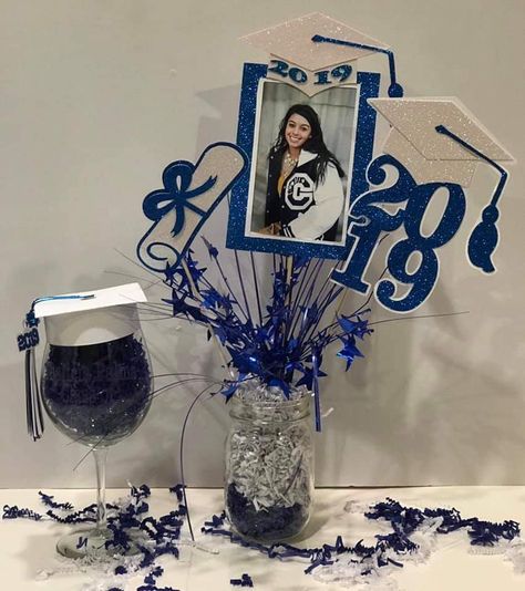 Royal Blue And Silver Graduation Party, Graduation Party Ideas Blue And Silver, Center Piece For Grad Party, Graduation Centerpieces With Pictures, Blue And Silver Graduation Party Ideas, Graduation Cap Centerpieces, Graduation Centerpieces For Boys, Graduation Party Centerpieces For Boys, Graduation Centerpiece Ideas For Boys