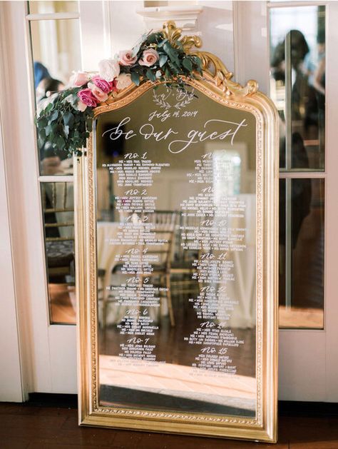 Quinceanera Sign In Ideas, Table Seating On Mirror, Mirror Table Chart Wedding, Seating Chart On A Mirror, Gold Mirror Table Seating Chart, Mirror Calligraphy Wedding, Seating Chart Gold Mirror, Wedding Seating Chart Ideas Mirror, Vintage Mirror Seating Chart