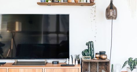 How to reduce TV glare and get rid of annoying screen reflections - CNET Hide Router, 9 Aesthetic, Internet Router, Narrow Shelves, Window Reflection, Lighting Plan, Aesthetic Space, Tv Screen, Bright Rooms