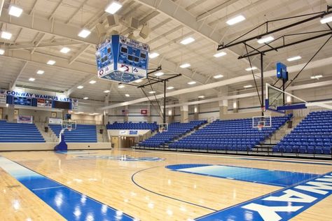 This is a high school gym.  I think we should have a gym like this because it has lots of room for physical education classes and also it has a lot of space for fans.  It's important for the gym to be nice because lots of athletic event's are held here.  This is right-brained because the stands are in a interesting design and the lights at the top aren't like most gyms School Gym Background, School Gym Design, School Gym Aesthetic, Highschool Design, Ruang Gym, High School Gym, Boarding School Aesthetic, High School Design, Concession Stands