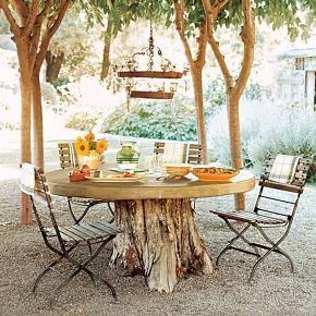 top 10 easy backyard ideas for entertaining, Repurpose your tree stumps Make an outdoor table by adding a tabletop to one of your tree stumps You can also transform old trunks into plant pots Just fill with soil plant with flowers and voila You ve recycled your tree stumps Tree Stump Furniture, Dreamy Gardens, Tree Stump Table, Stump Table, Easy Backyard, Tree Table, Diy Garden Furniture, Tree Stump, Outdoor Wood