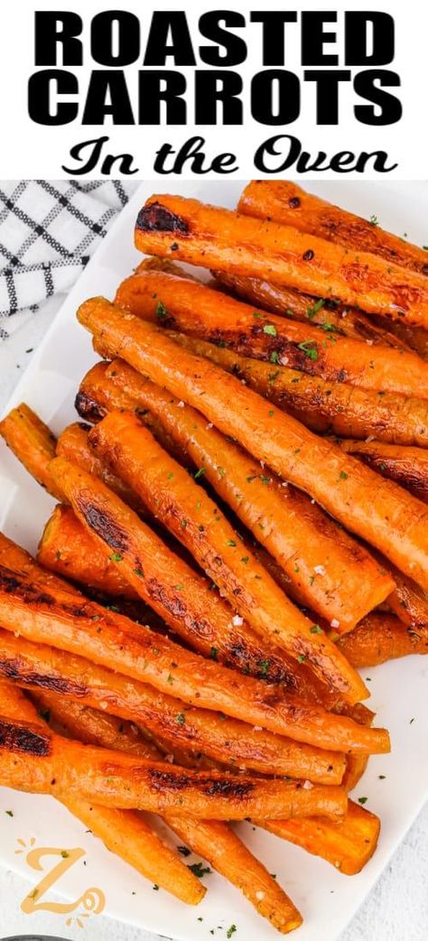 This recipe for oven roasted carrots is an easy and delicious way to get healthy veggies into your diet! Peel carrots and slice into even-sized pieces, then coat in oil, salt, and pepper, and roast until tender, glazed, and slightly browned. Roasted carrots in the oven are delicious nestled on a plate with chicken, beef, pork, or pot roast. Cook them with potatoes, onions, and broccoli for extra flavor. #ovenroastedcarrots #ourzestylife # roastedcarrotsintheoven #roastedcarrotsrecipe Roasted Carrots With Cinnamon, Roasted Carrots And Peppers, Carrots In The Oven Recipes, Oven Roasted Peppers And Onions, Whole Roasted Carrots, Roasted Carrots And Potatoes, Roasted Whole Carrots, Recipes Supper, Carrots In Oven