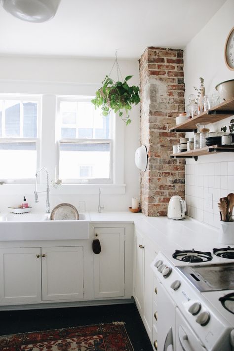 Inside the Nashville Home of an Airbnb Instagram Star Brick Chimney In Kitchen Exposed, Exposed Brick Pillar, White Kitchen Exposed Brick, Kitchen With Exposed Brick Chimney, Brick And White Kitchen, White Wash Chimney, Brick Pillar Kitchen, Brick Column In Kitchen, Brick Corner Wall