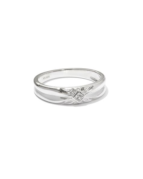 With its bold band, etched detailing, and pop of sparkle, our hearts burst thinking about the Maia Sterling Silver Square Bezel Band Ring in White Sapphire. This ring uses traditional hand-engraving techniques to create gorgeous linear designs and tons of texture. It’s understated, unique, and made for you to style season after season. Metal Sterling Silver Why Sterling Silver? Our Sterling Silver collection features elevated styles to wear time and time again. With a base of both pure silver an Simple Pretty Wedding Rings, Silver Engagement Rings Thick Band, Chunky Sterling Silver Rings, Silver Band Ring Women, Dainty Wedding Ring Silver, Thick Silver Wedding Band Women, Wedding Ring Silver Simple, Silver Bezel Ring, Masc Lesbian Engagement Rings