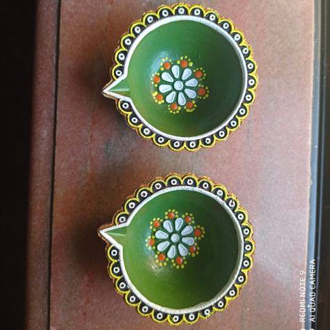 These are hand painted and designed by me. For order you can either dm here or on instagram. Also do checkout and follow on my instagram page. Link is given above Diy Diya Paintings, Diwali Business Ideas, Plain Diya Paintings For Diwali, Small Diya Painting, Diya Decoration Ideas Painting, Big Diya Painting, Hand Painted Diyas, Painting On Diya For Diwali, Painted Diyas For Diwali