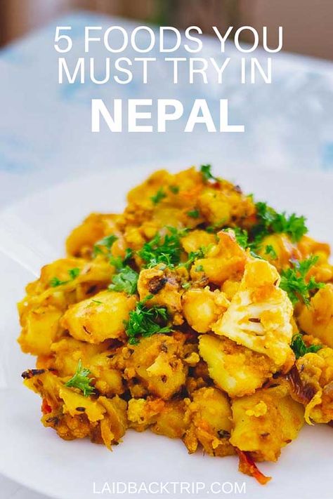 Nepal offers diverse variety of foods from traditional cuisine to popular international dishes. In this Nepal Food guide we're throwing our list of 5 most delicious and favorite Nepalese food at you that we had while trekking Annapurna Circuit and visiting Kathmandu and Pokhara | #food #nepalesefood #asianfood #nepal #cuisine Nepalese Food, Nepal Food, Nepali Food, Travel Nepal, International Dishes, Best Meals, Annapurna Circuit, Aloo Gobi, Nepal Travel