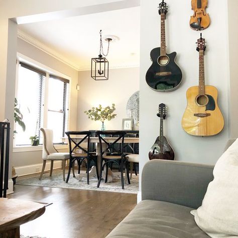 35 Simple Guitar Wall Display Ideas For Music Lovers | HomeMydesign | HomeMydesign Guitars On Wall, Wall Dining Room Decor, Space Blueprint, Guitars On The Wall, Wall Dining Room, Living Pequeños, Home Music Rooms, Guitar Room, Dining Room Remodel